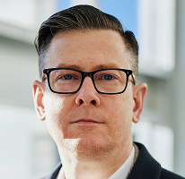 Alexander Hughes, CEO executivo de uma empresa de trading de criptomoedas, retrato