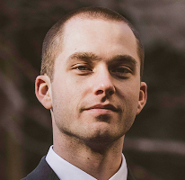 Analista de trading Thomas Whitfield especializado no mercado cripto, retrato